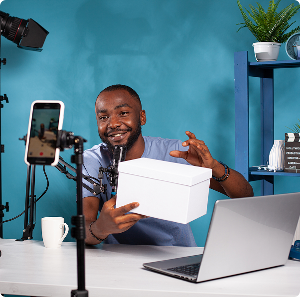 Content creator filming an unboxing
